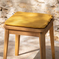 KIKO - Galette de chaise indoor & outdoor en tissu déperlant - jaune argan