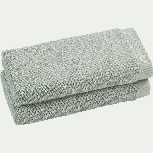 COLINE - Lot de 2 serviettes invités en bouclettes de coton bio 30x50cm - vert olivier