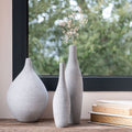 CALCIS - Vase bouteille en polystone effet béton H30cm - gris moyen
