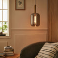 JOANET - Suspension en laiton et globe en verre fumé D22cm - doré