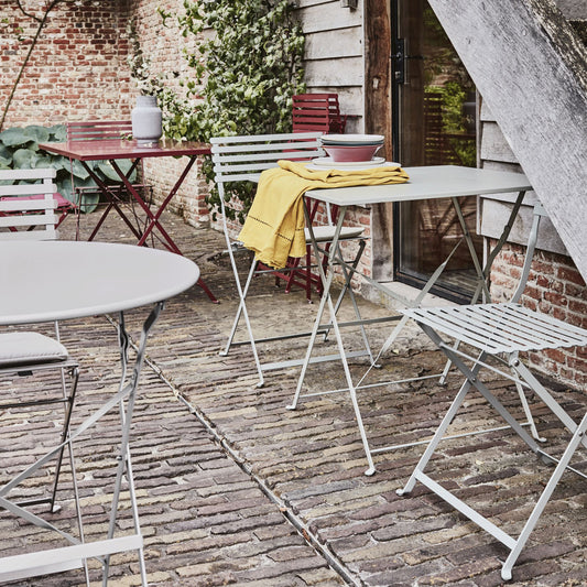 CERVIONE - Table de repas jardin pliante en acier - vert olivier (2 places)